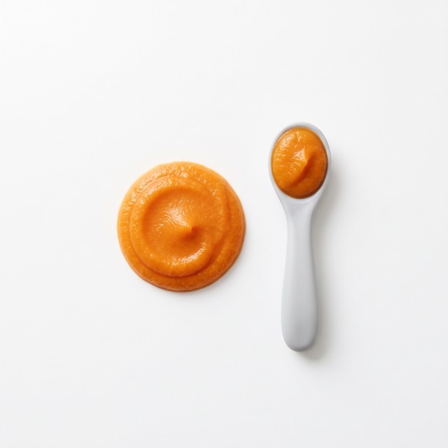 A smooth first puree in a small bowl